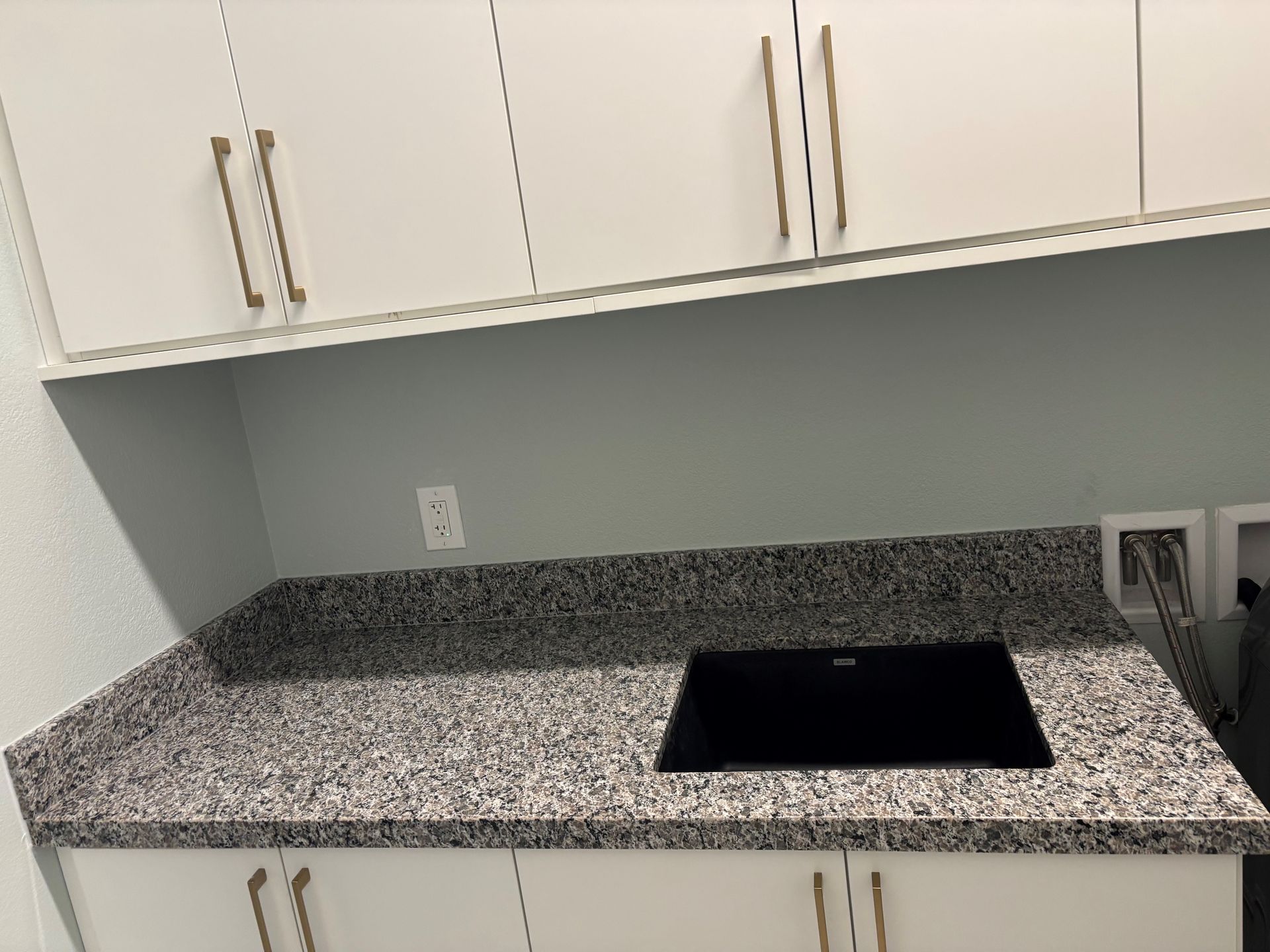 Quartz laundry room countertop installation
